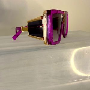 Women Fashion Sunglasses. Purple with black tint.